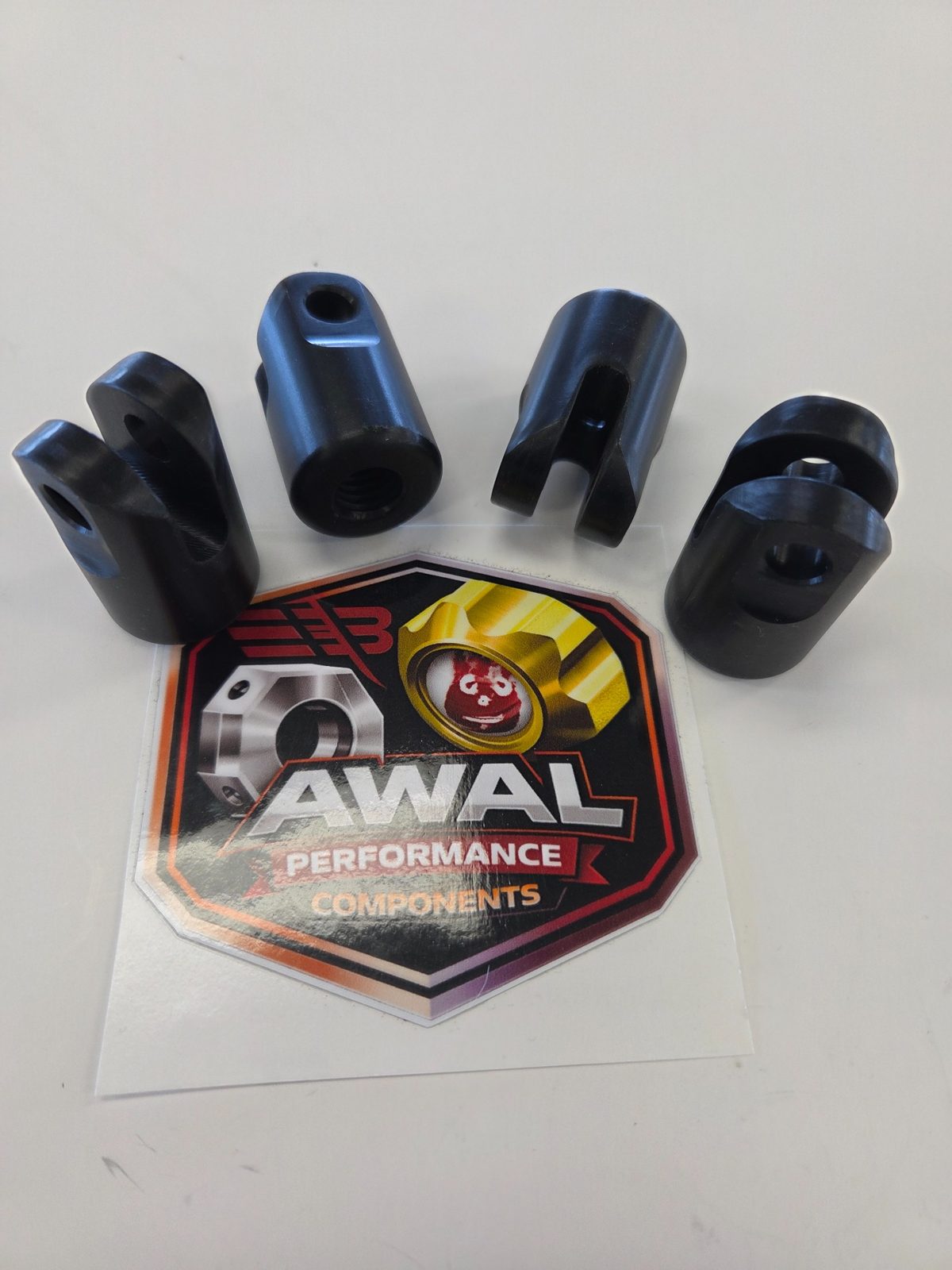 Set of black anodized AWAL accessory clamps and mounts