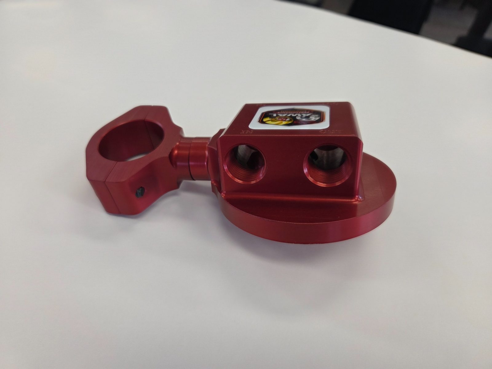Red anodized AWAL oil filter mount with integrated tube clamp