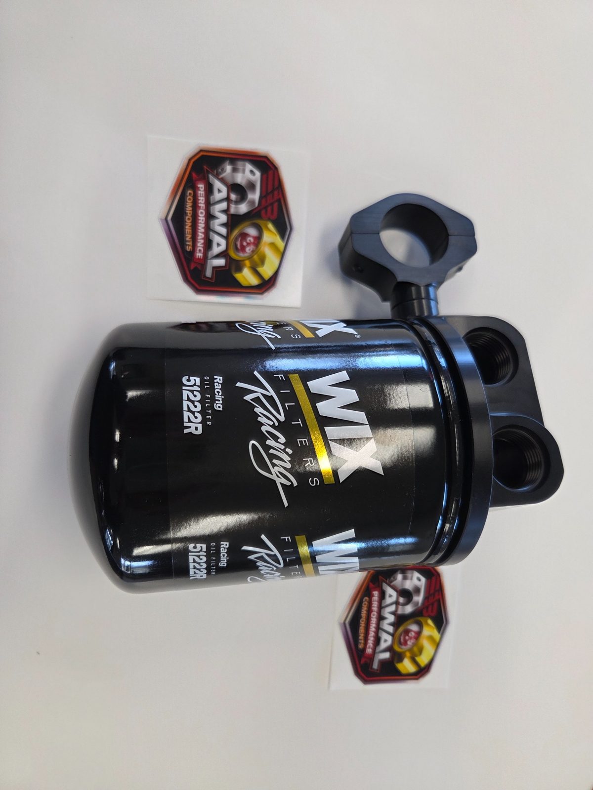 Black anodized AWAL filter mount assembled with a racing oil filter