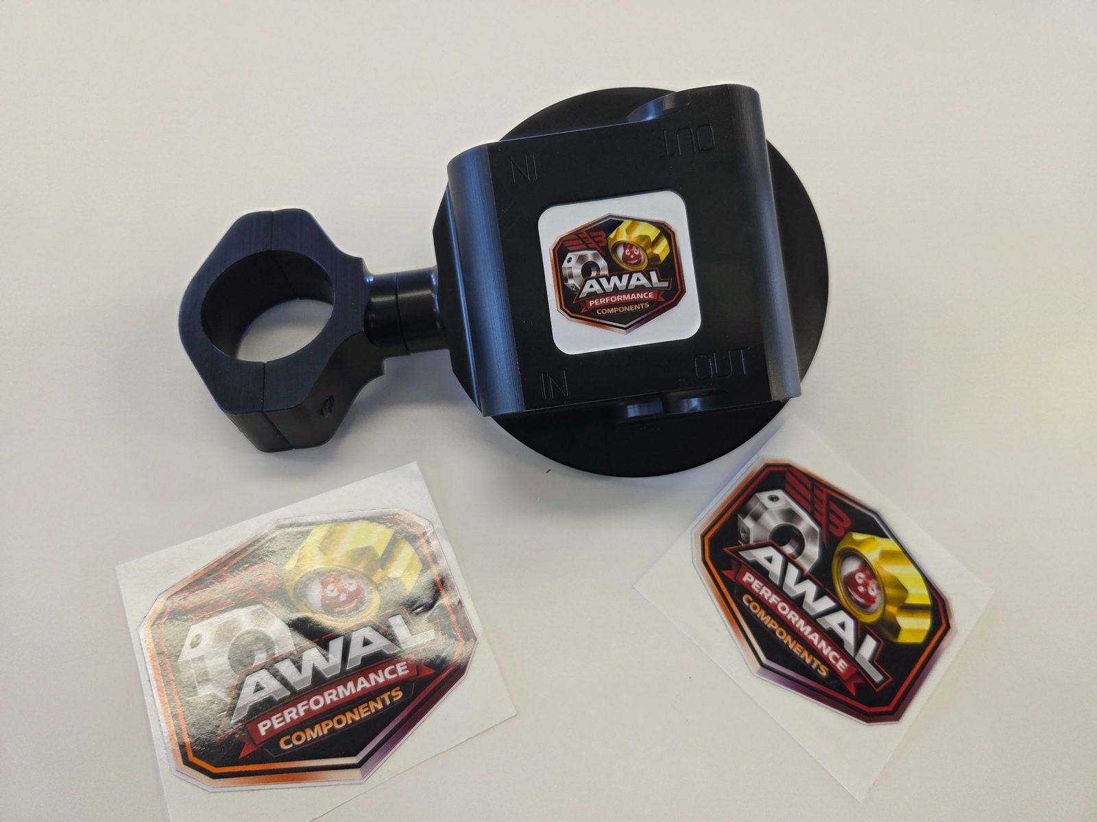 Black anodized AWAL filter mount with AWAL Performance Components decals