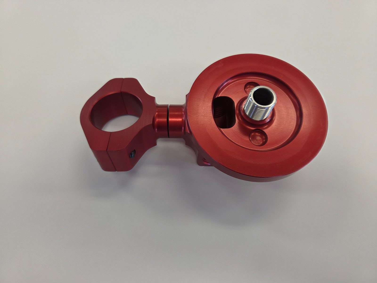 Red anodized AWAL filter mount shown from the port side